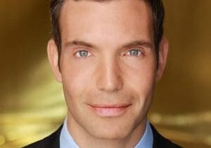 Professional man in suit with a confident expression.